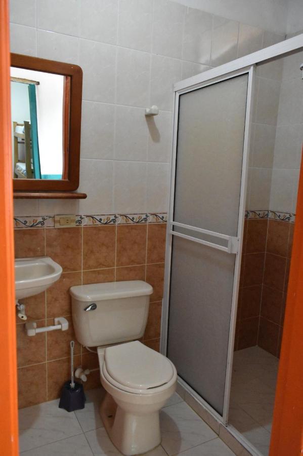Origen Hostel Jardin Bagian luar foto