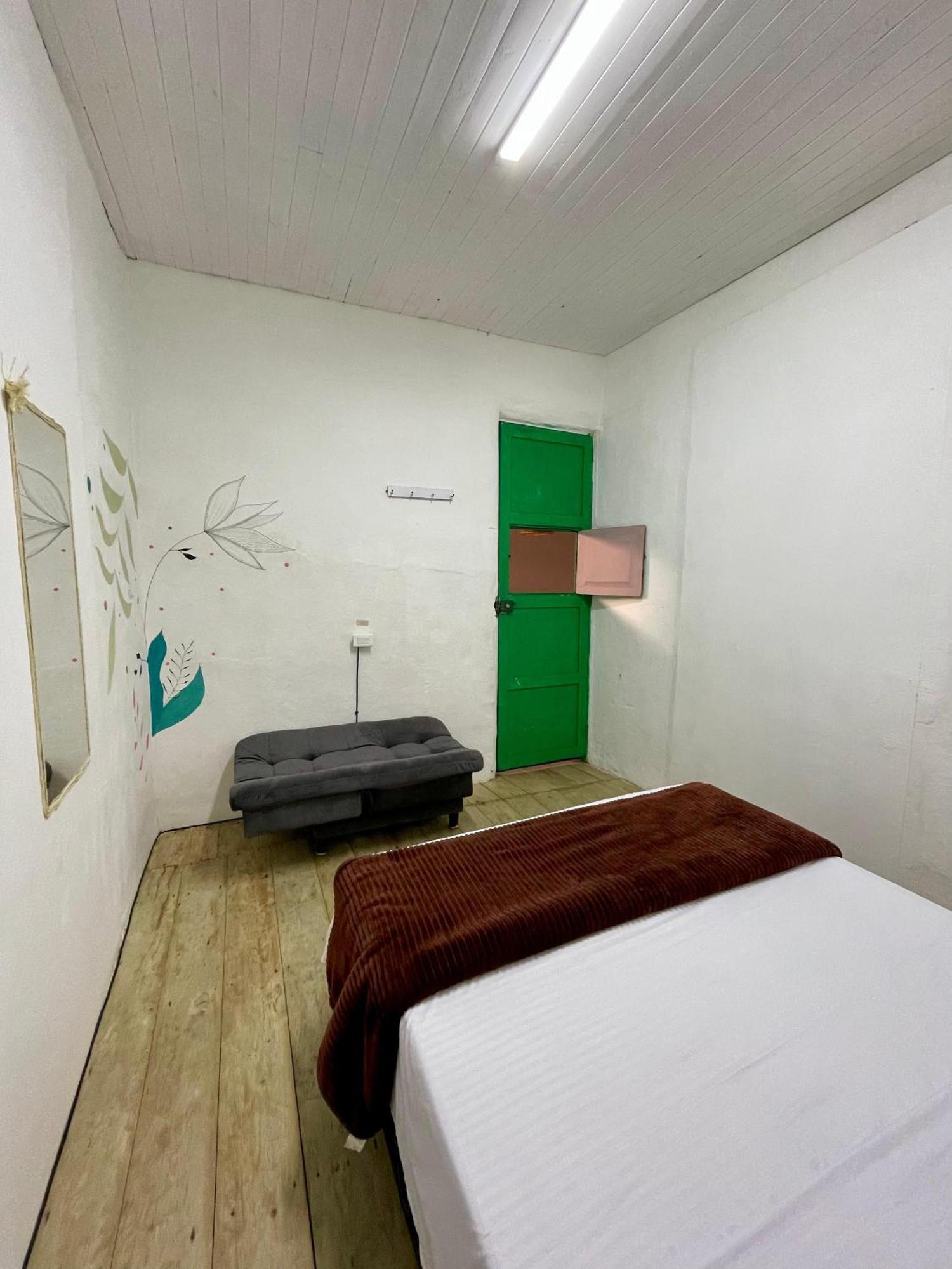 Origen Hostel Jardin Bagian luar foto