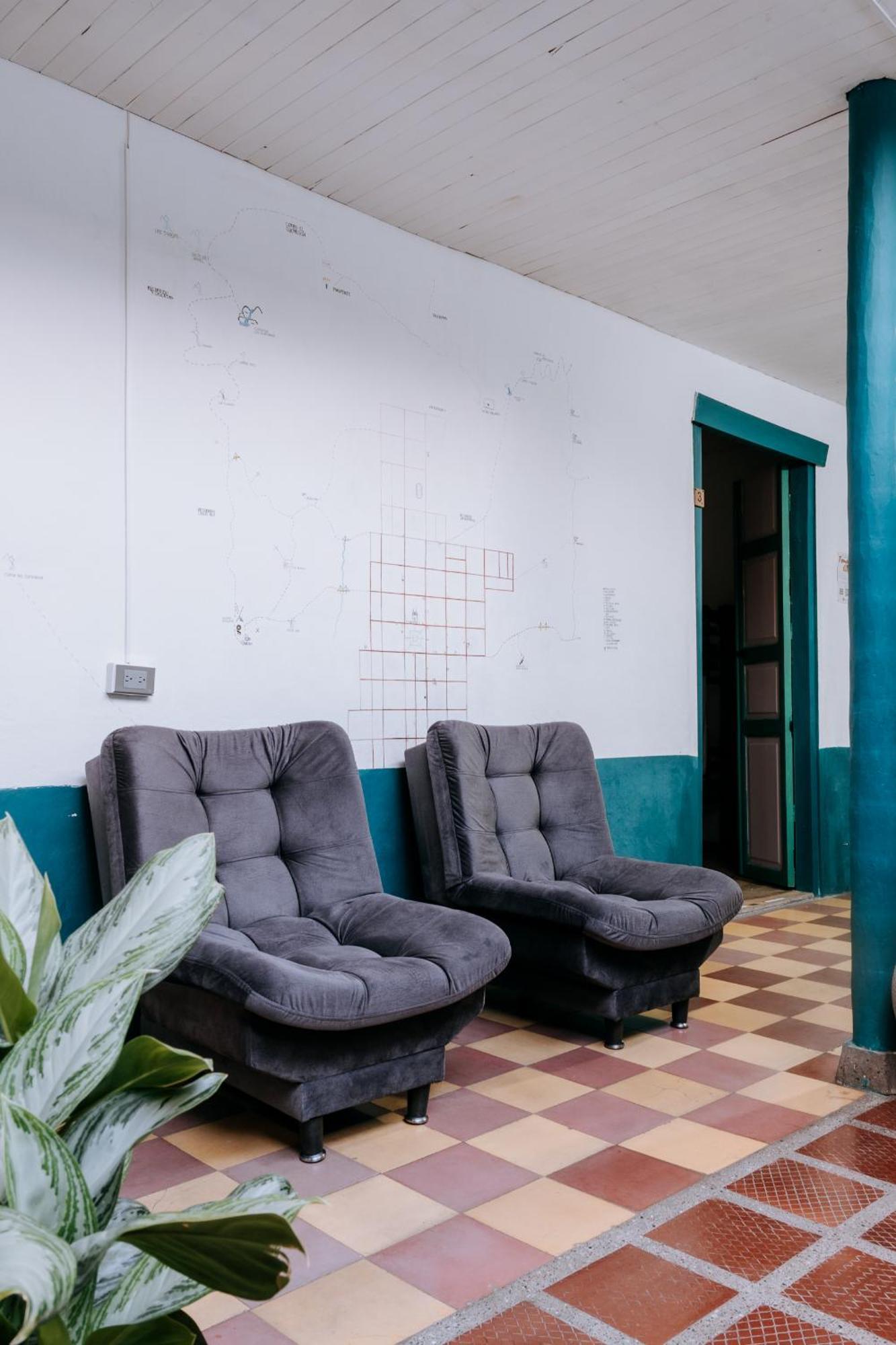 Origen Hostel Jardin Bagian luar foto