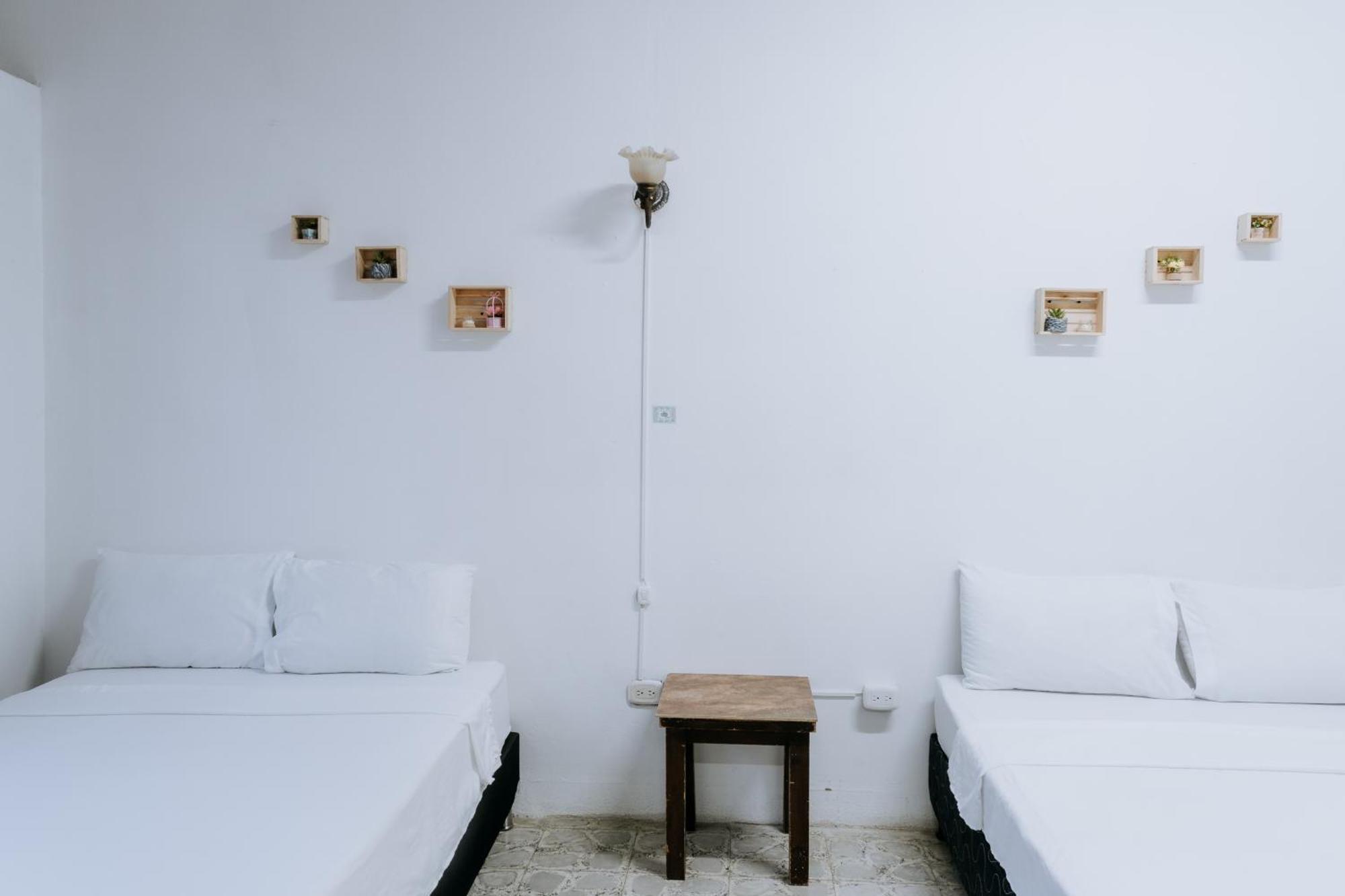 Origen Hostel Jardin Bagian luar foto