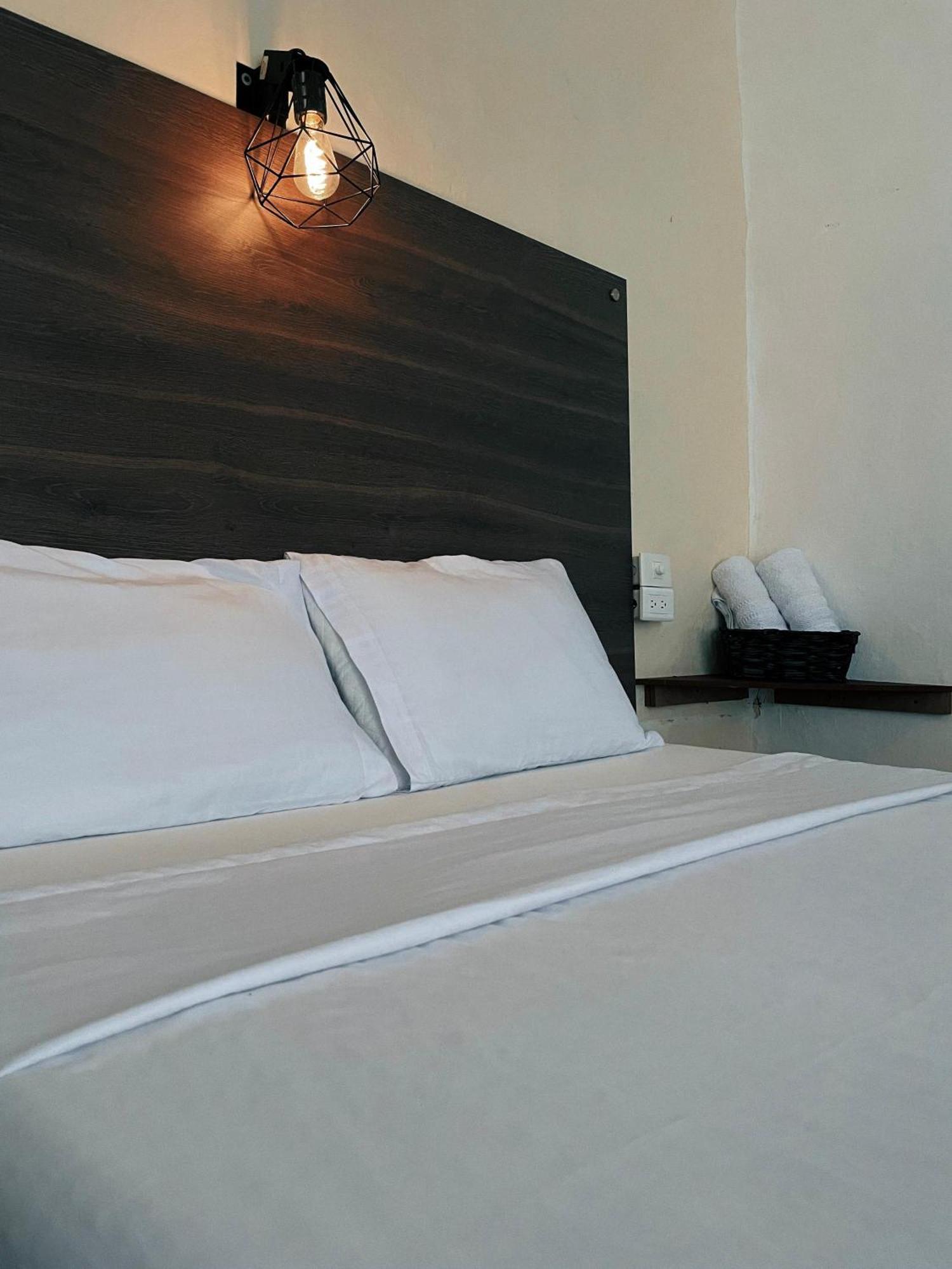 Origen Hostel Jardin Bagian luar foto